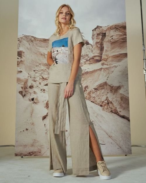 Ilgos su skeltukais kelnės in Dydis 36 and Spalva Natūrali