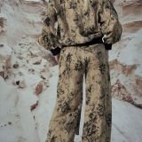 Laisvo silueto margintos kelnės