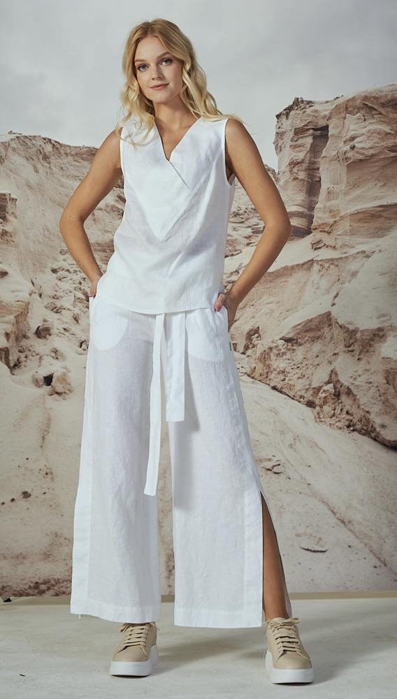 Trumpesnės kelnės su skeltuku