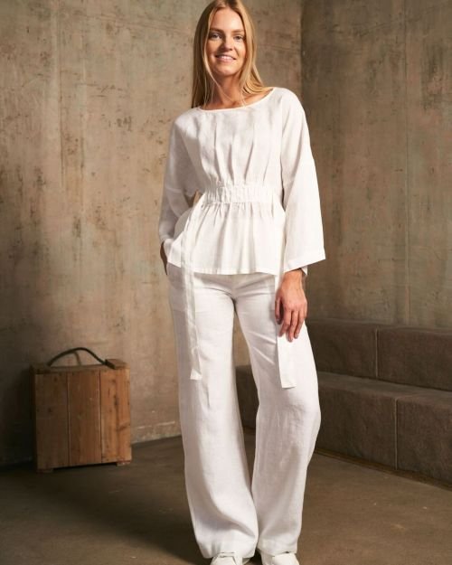 Baltos tiesaus silueto universalios lininės kelnės