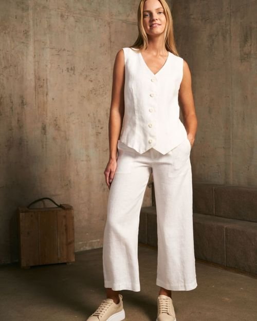 Balta vienspalvė asimetrinė liemenė