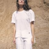 Baltos laisvesnio silueto lininės kelnės