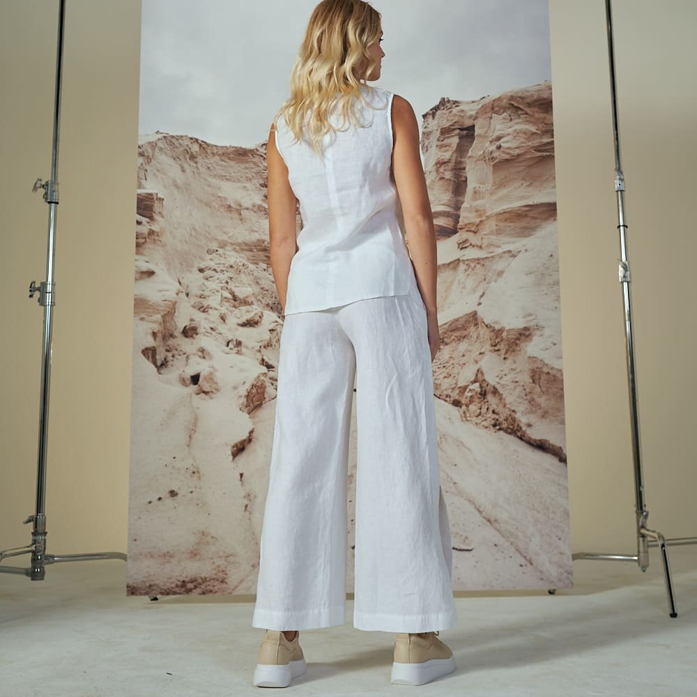 Trumpesnės kelnės su skeltuku