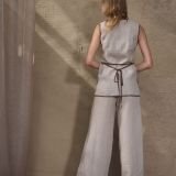 Plačios natūralaus lino spalvos kelnės