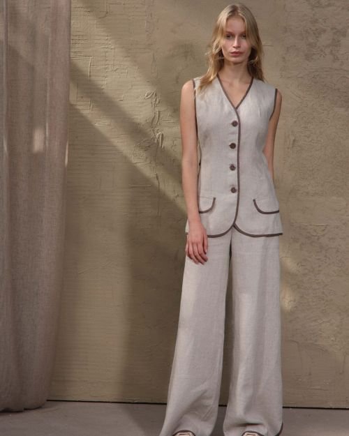 Plačios natūralaus lino spalvos kelnės